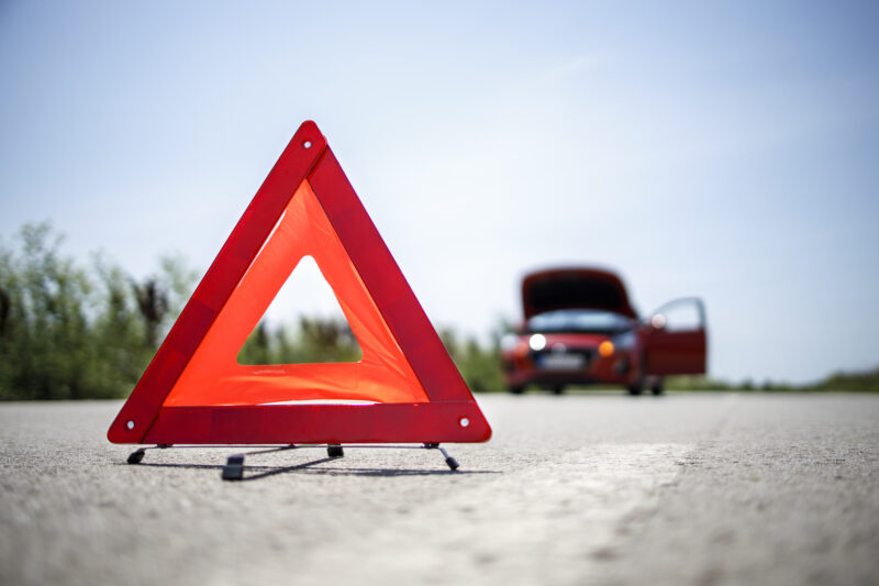 Portable warning triangle on the street
