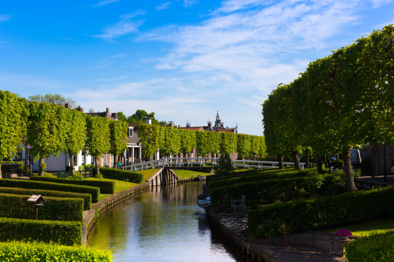 IJlst, Friesland, Netherlands: Tree-Lined Canal, Church Steeple, Bridge