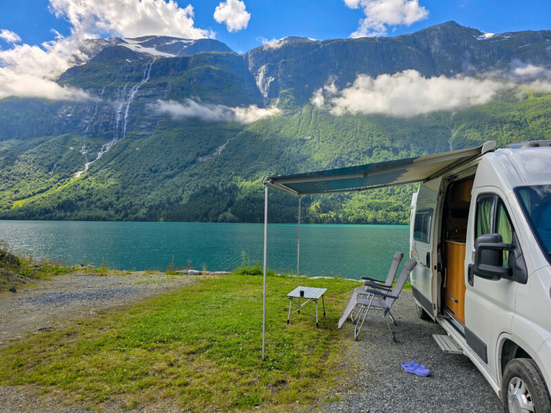 Tranquil Camping by Stunning Fjord in Norway Under a Bright Blue Sky