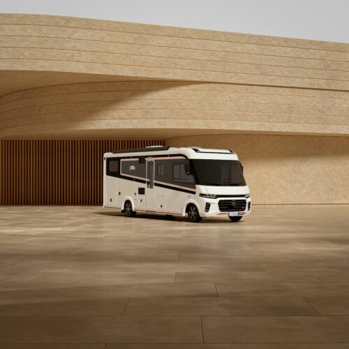 Camper in voor een gebouw.